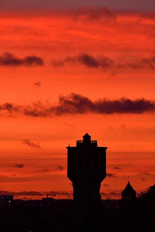 a po of an airport control tower at night