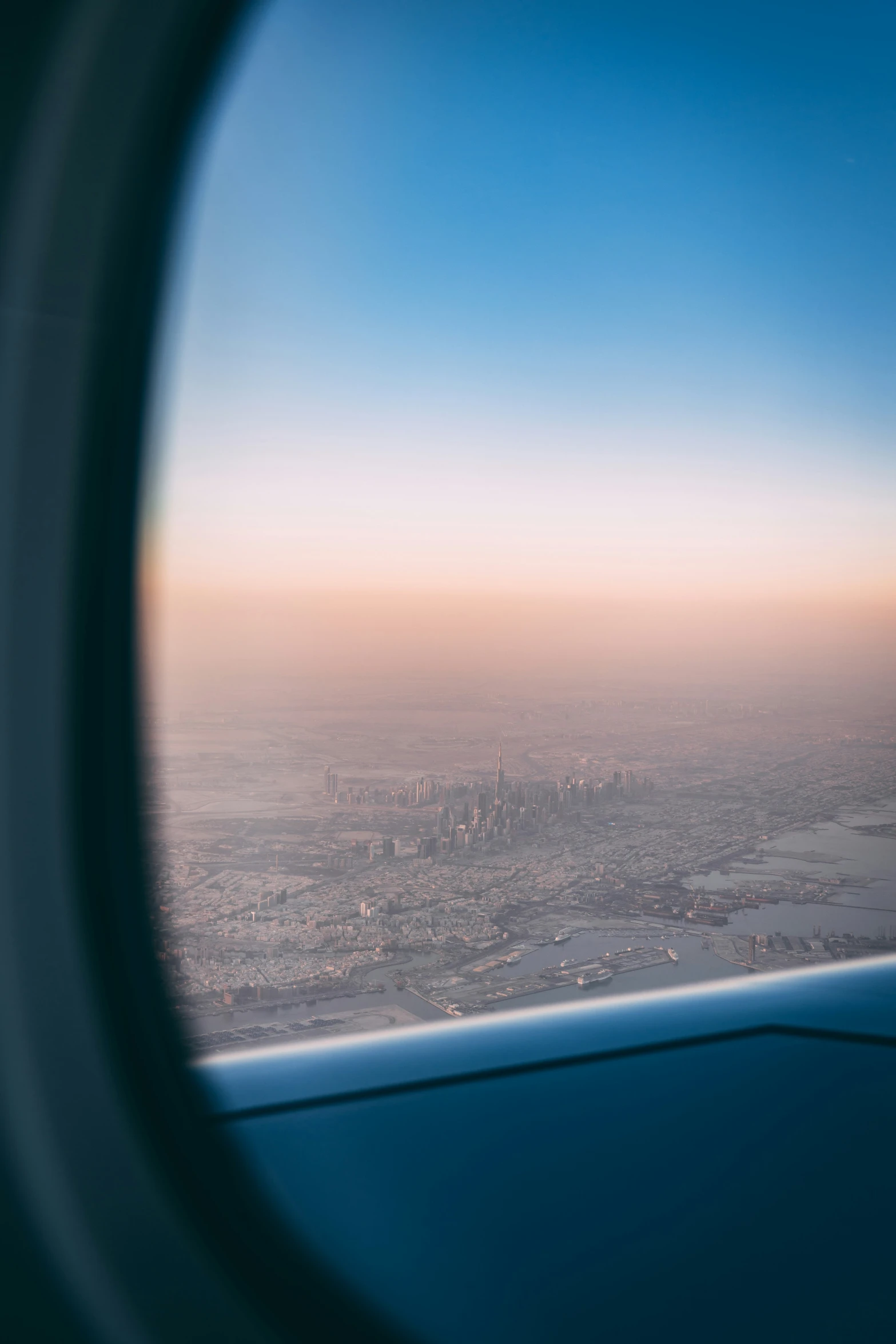 the view out an airplane window is seen through it