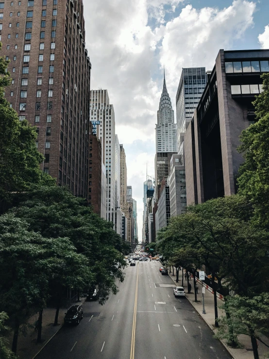 a city street that has a road with cars on it