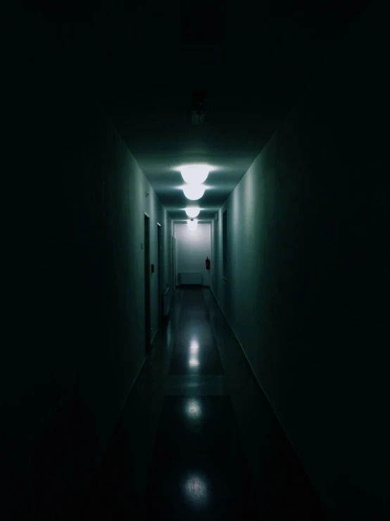 the hallway leading into an emergency room is dark