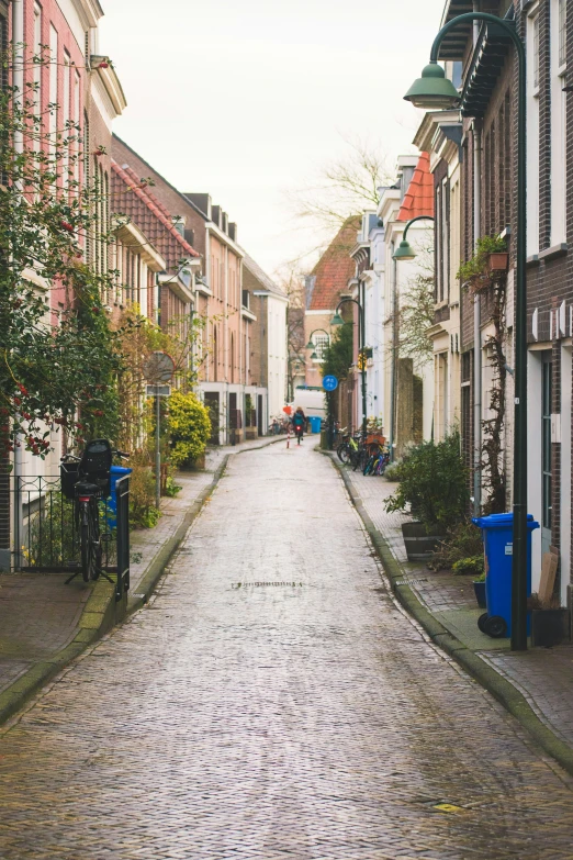 a cobblestone road in an old city