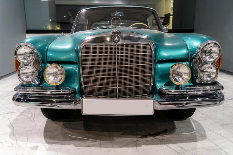 a car is shown on display in a museum