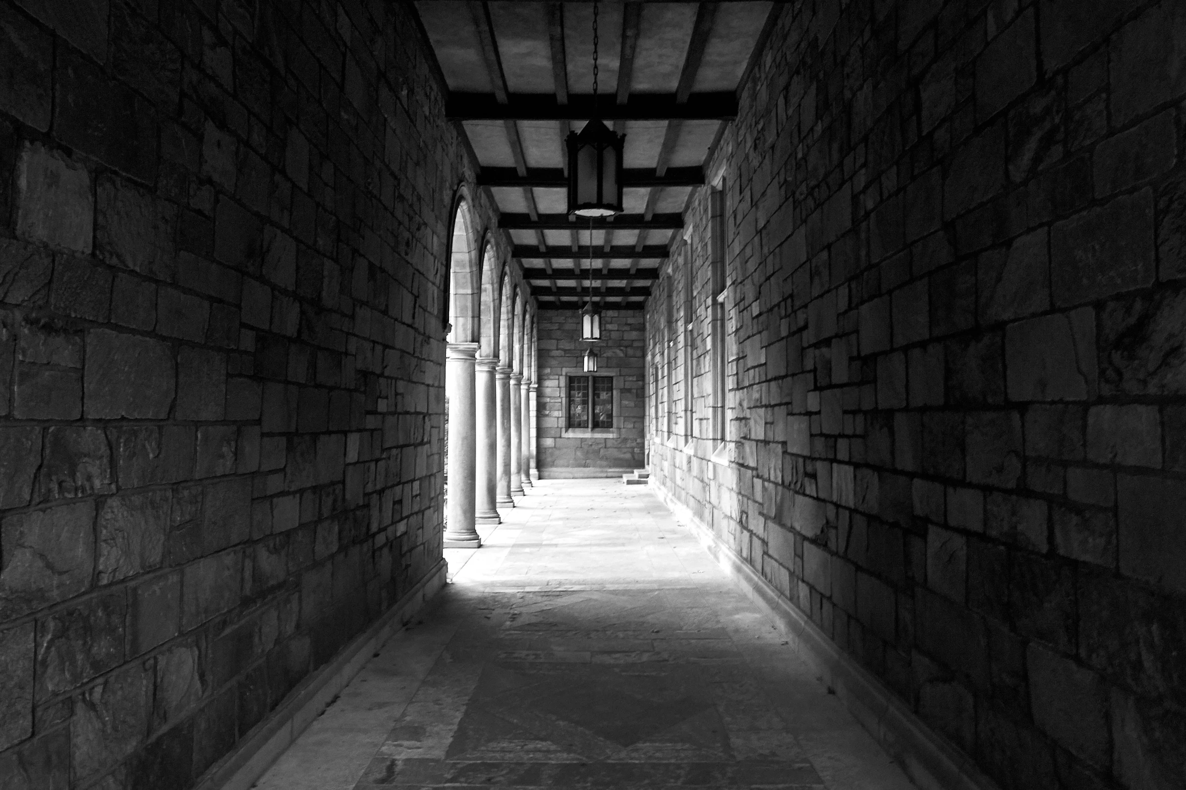 long hallway lined with pillars that are built into each other