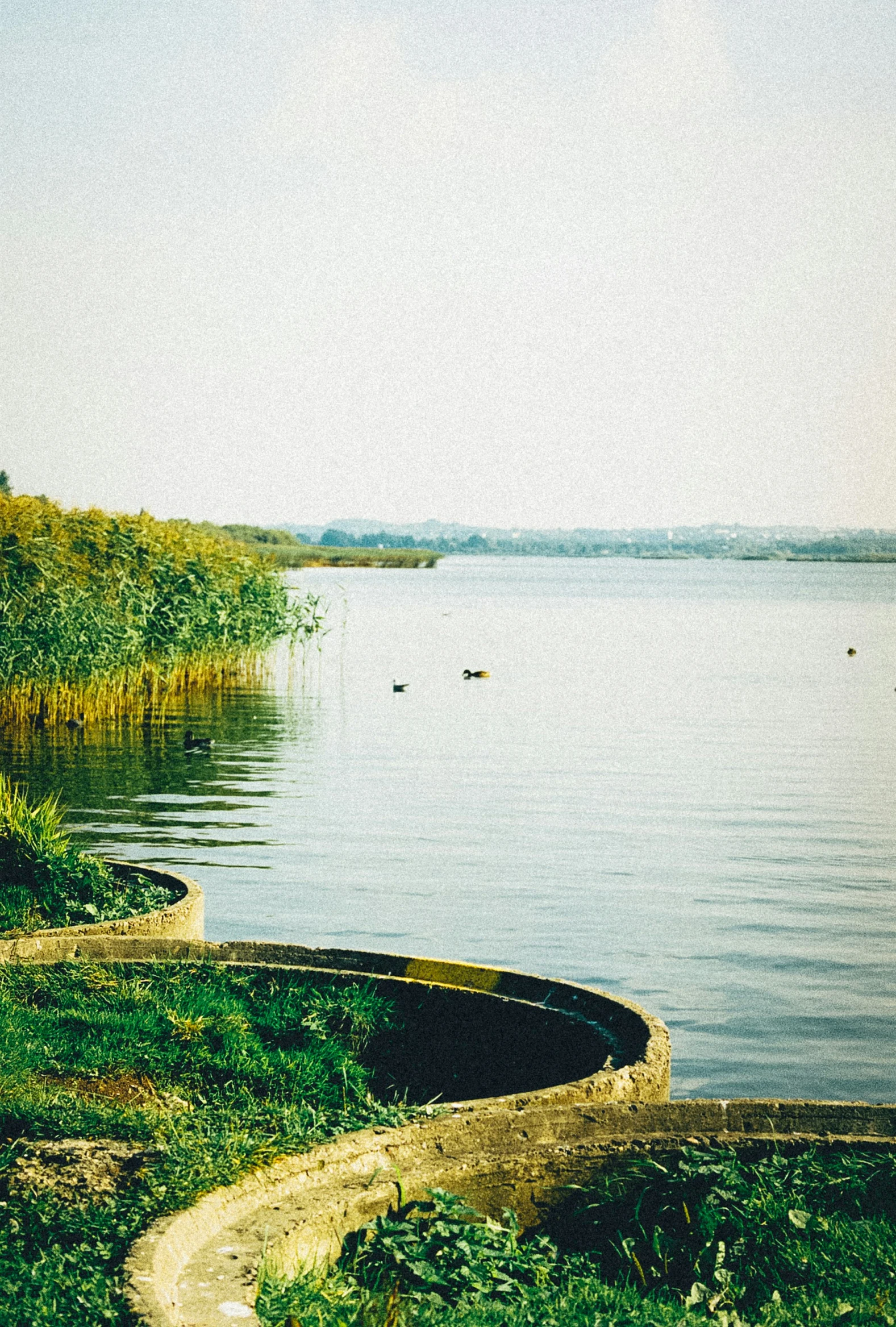 the empty boat is at the water's edge