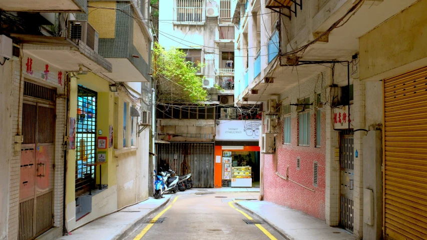 an empty alley with several buildings in it