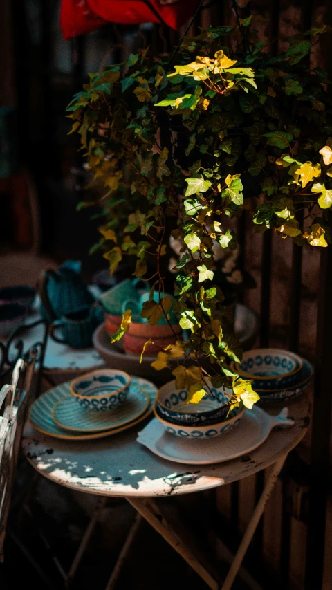 a table is set with dishes that have been placed on it