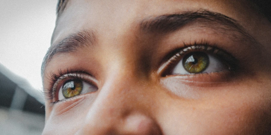 a woman making face with her long, thick eyelashes