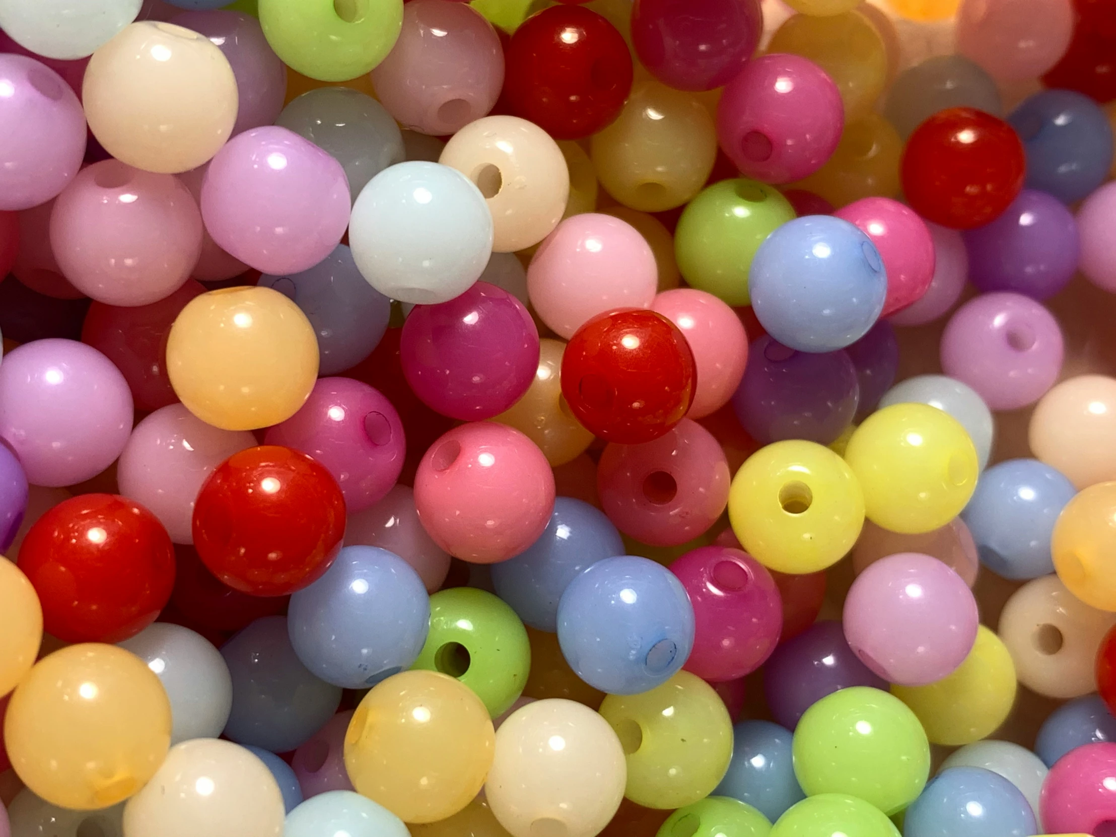 small beads are lined up with each other