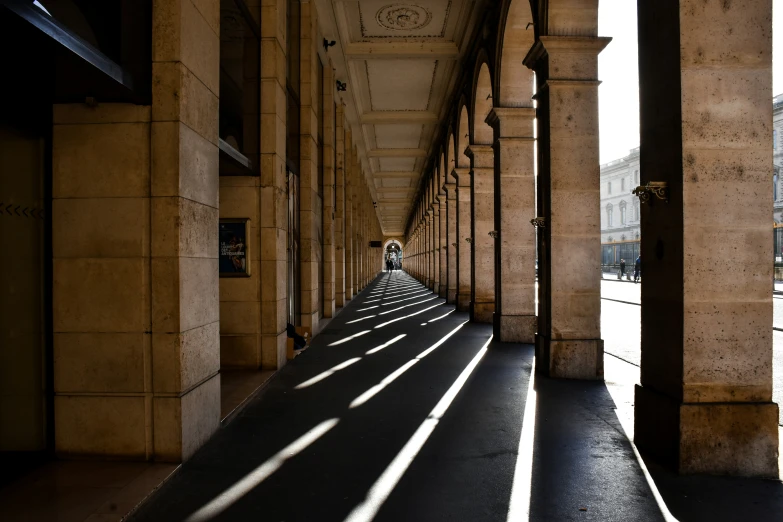 sun coming in on the sides of buildings with long windows