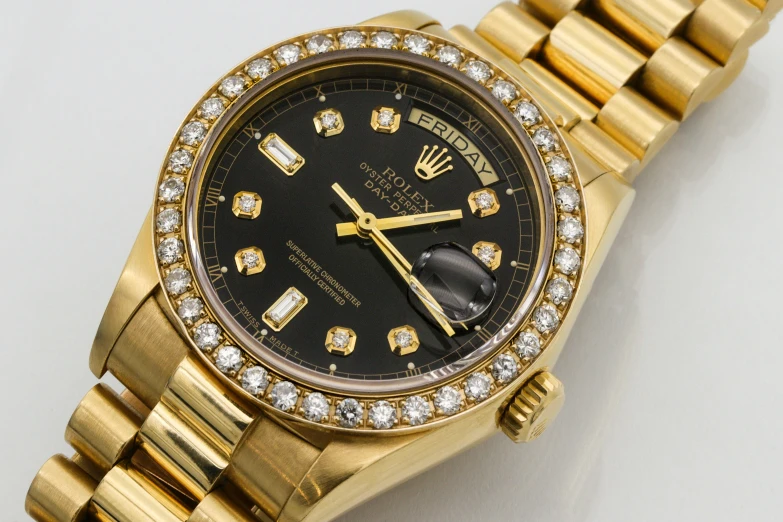 the watch has many diamond set accents on it