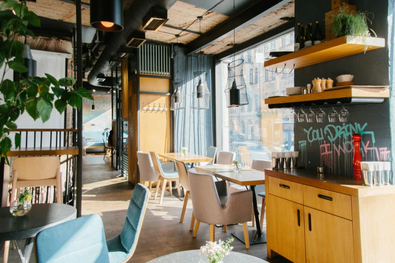 a restaurant with lots of tables and chairs and wooden shelves