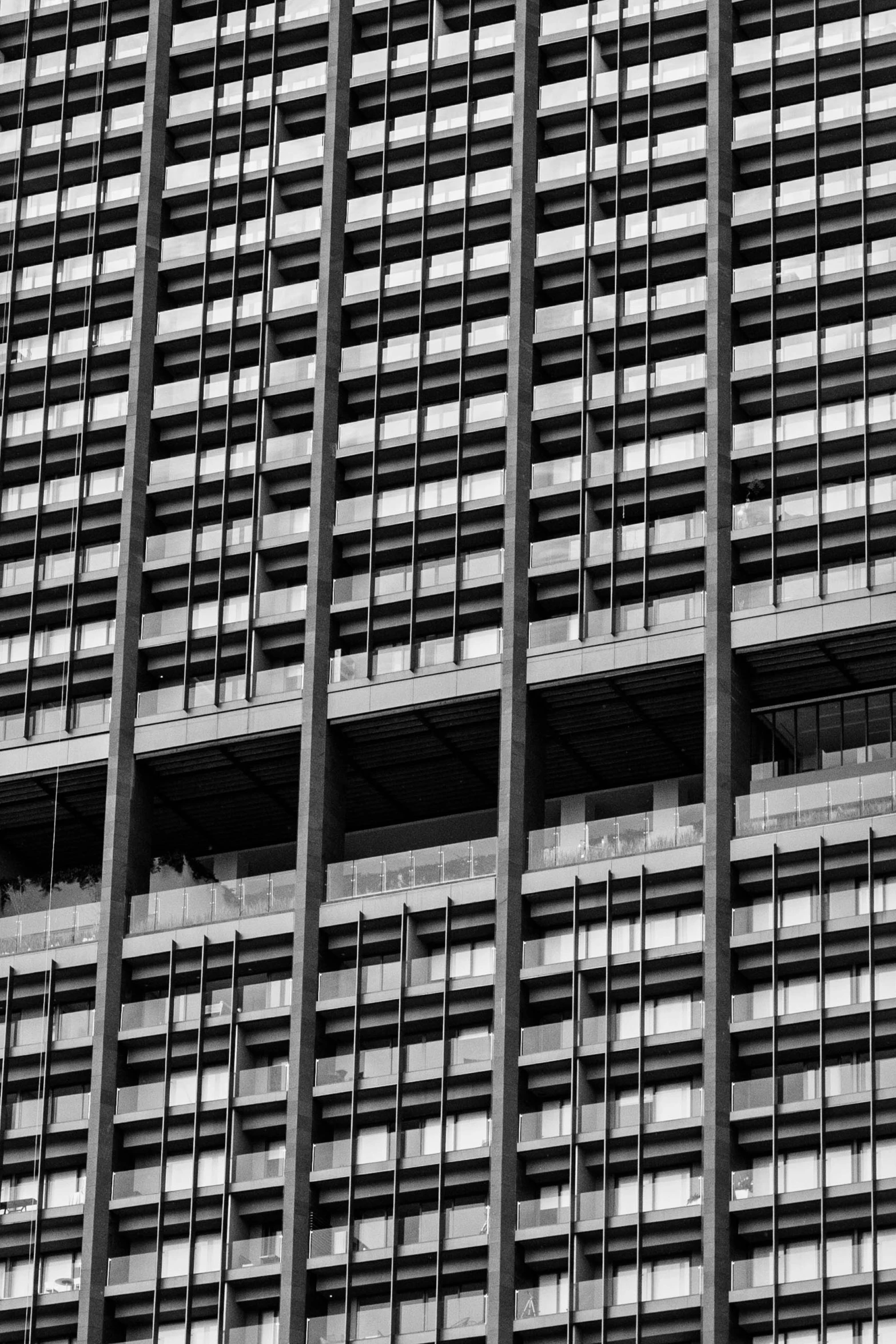 an image of a modern building facade in black and white