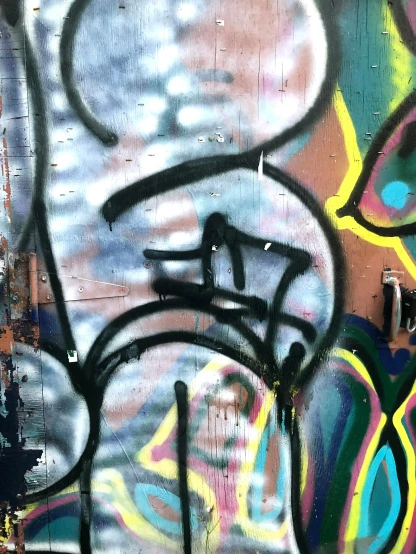 graffiti art on the side of a wall
