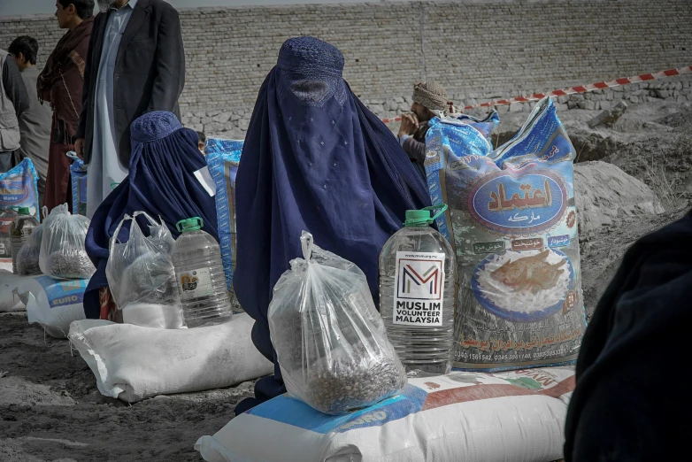 a group of bur bags sitting on top of sand