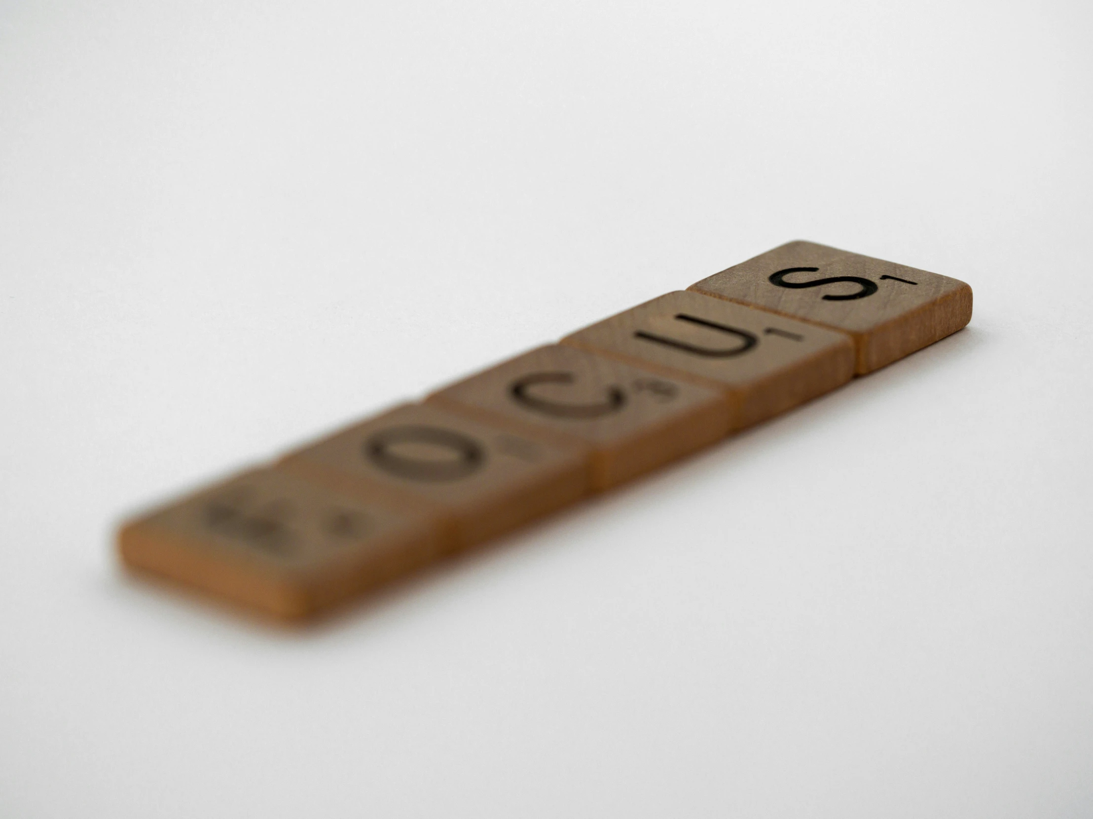 a close up po of a wooden number block