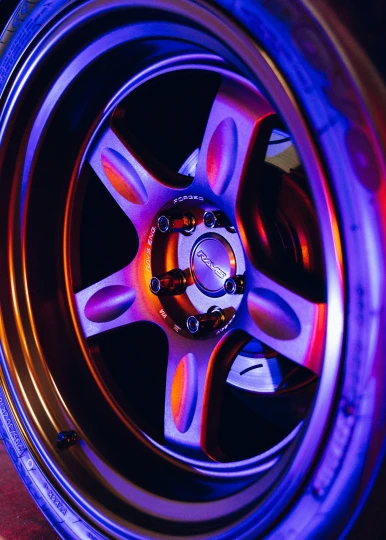 a close up of a spoke on a wheel on a vehicle