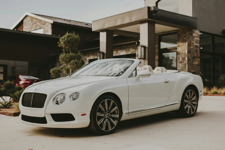 the front view of a very well - used bentley