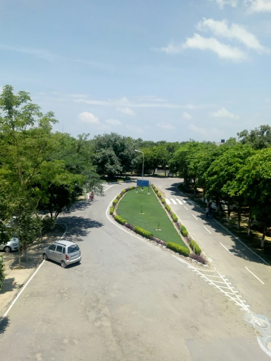 an empty parking lot on the side of a road