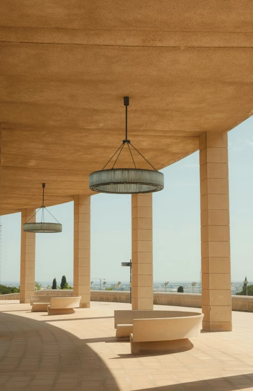 two light fixtures hanging from the roof of a building