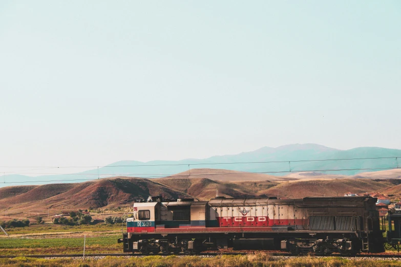 an image of a train going by on the tracks