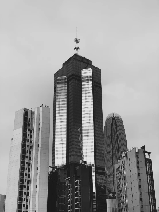 many different buildings on a cloudy day