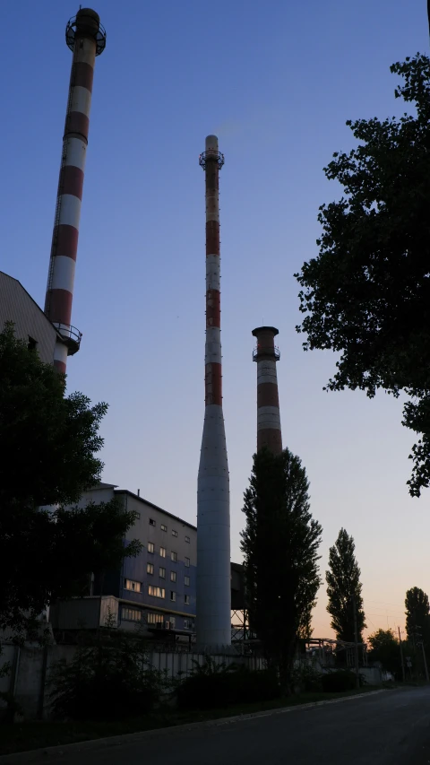 two chimneys with chimneys sticking out of it