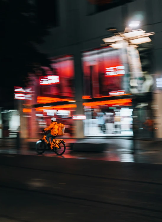 the motorcycle rider has stopped at a stoplight