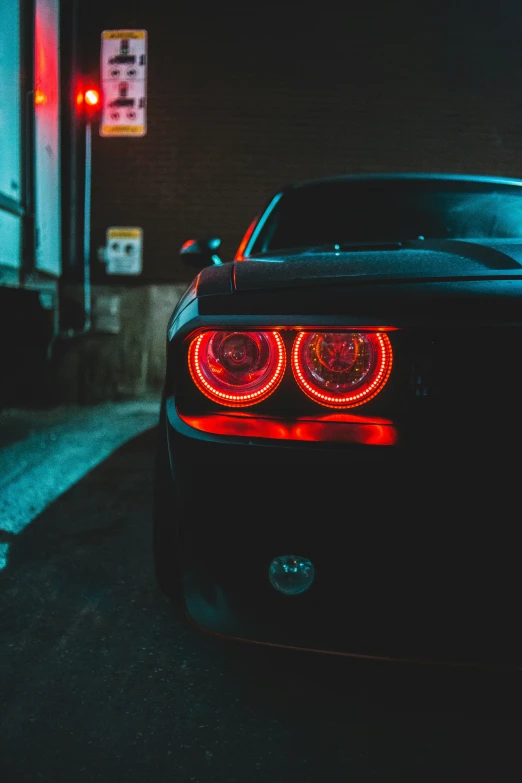 the front view of a parked black sports car