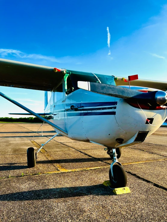 an airplane sitting on the tarmac of an airport