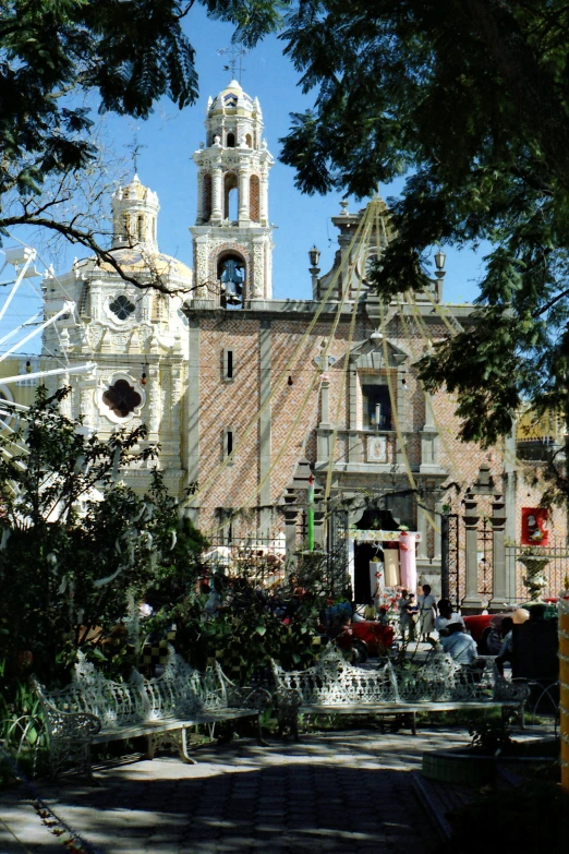 a beautiful church with a clock on the front