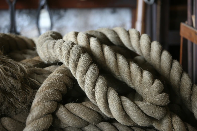 a close up of ropes with knots on them