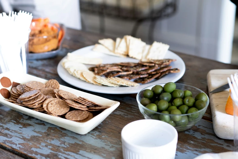 an assortment of food items and drinks on a table