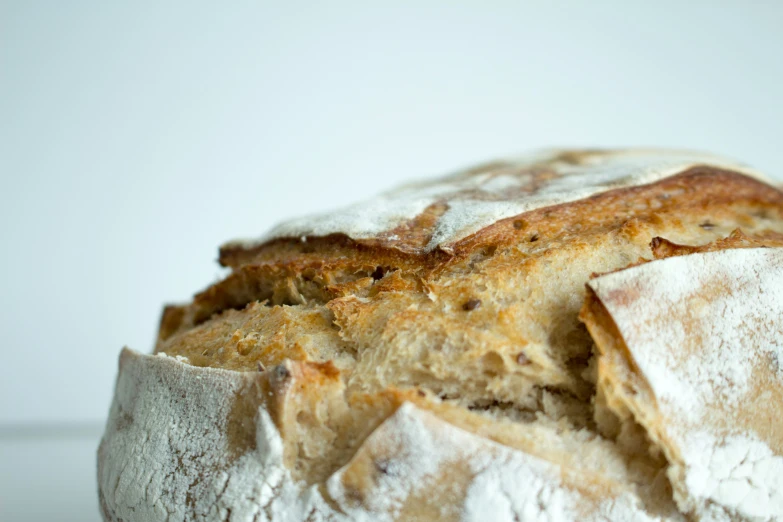 a loaf of bread with some dusted with sugar