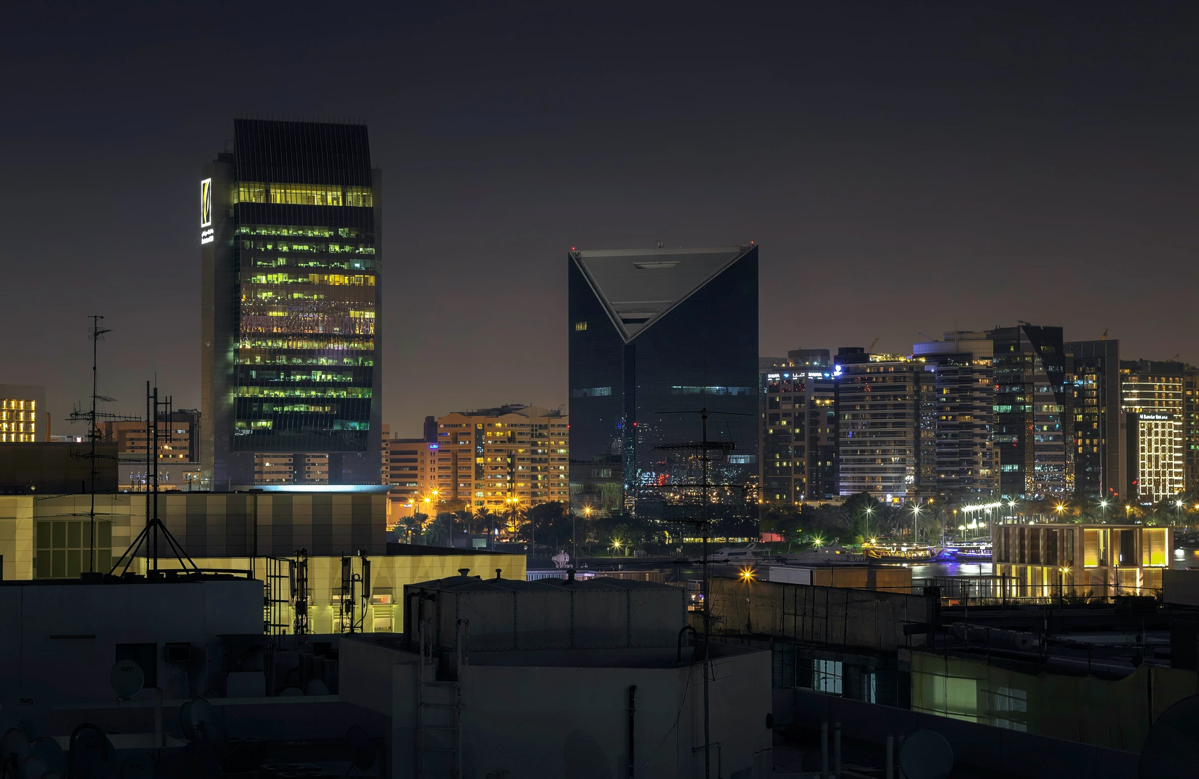 the view of a city from a rooftop at night