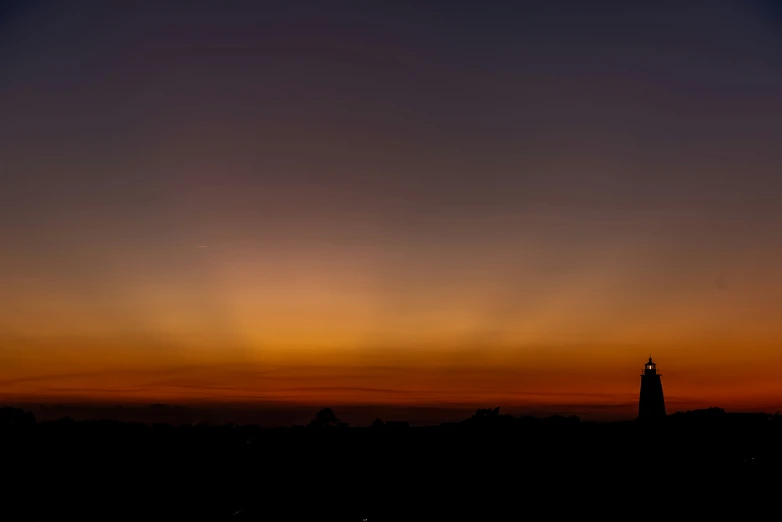 this is an image of sunset in the horizon with the sun just starting to be in a circle