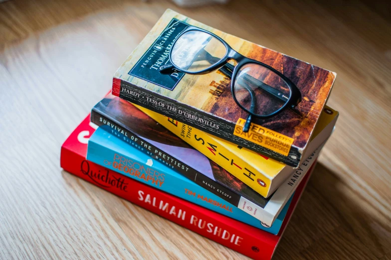 a stack of books on top of a table