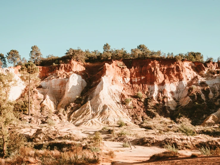 a cliff on the edge of a cliff in a mountain