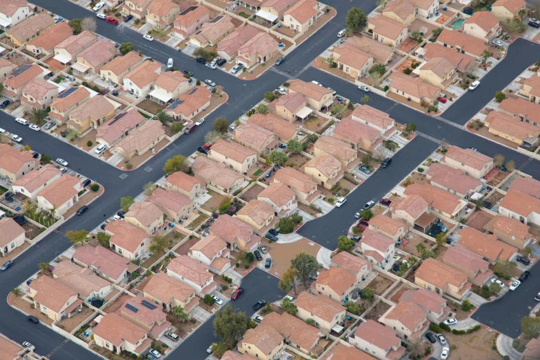 an aerial view of a neighborhood with houses in it