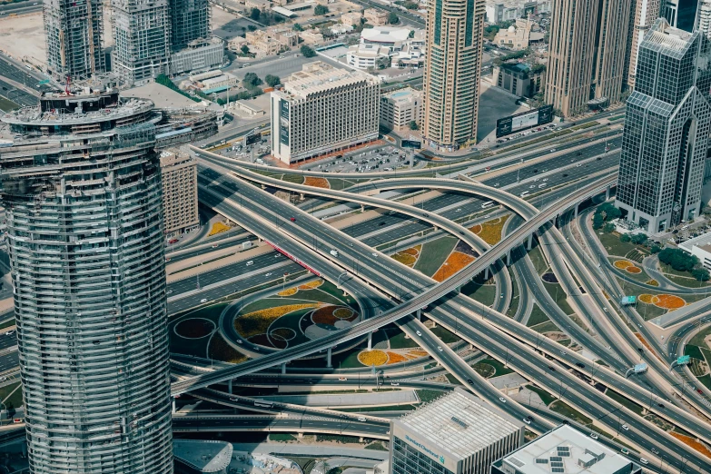 freeway intersection in large city during daytime with tall buildings