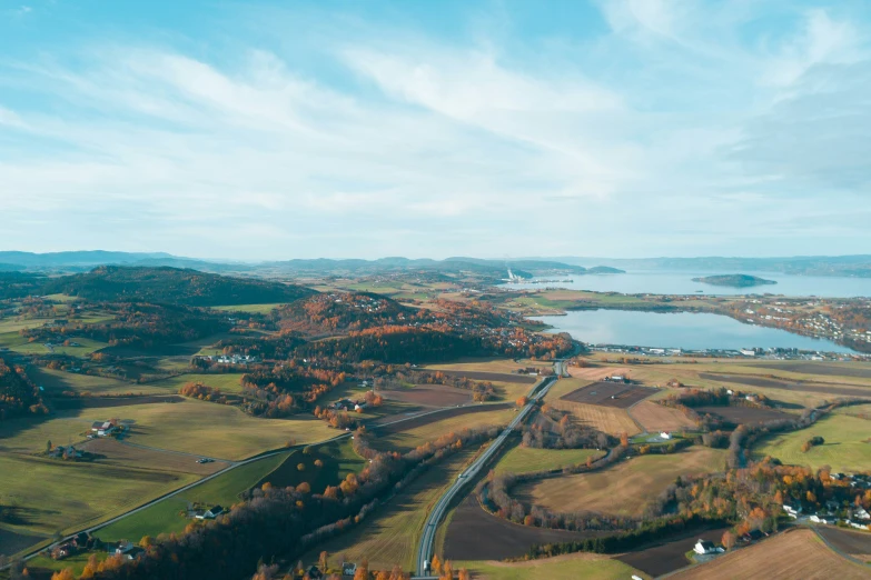 an aerial view of a village and roads