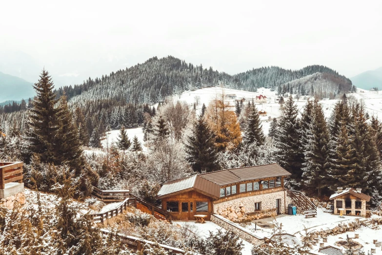 an image of a resort surrounded by mountains