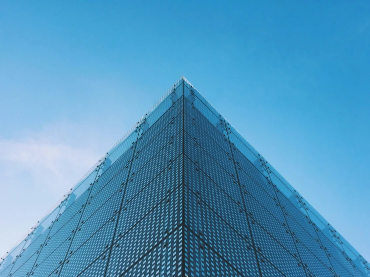a tall metal structure with lines on the side of it