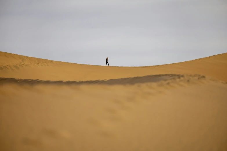 there is a person standing on top of a mountain