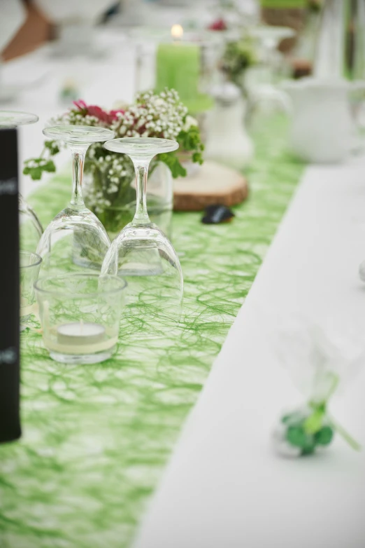 a couple of wine glasses are on a table