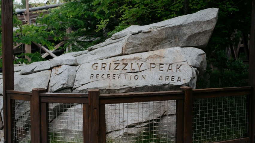 a large rock that is on display at the zoo