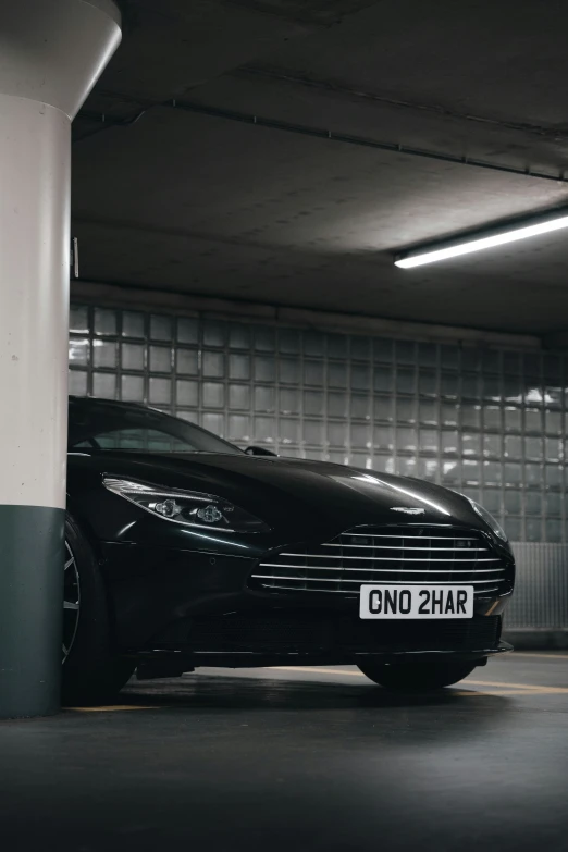 a black car parked in an underground parking space