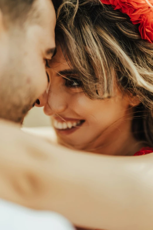 close up of a bride and groom holding each other