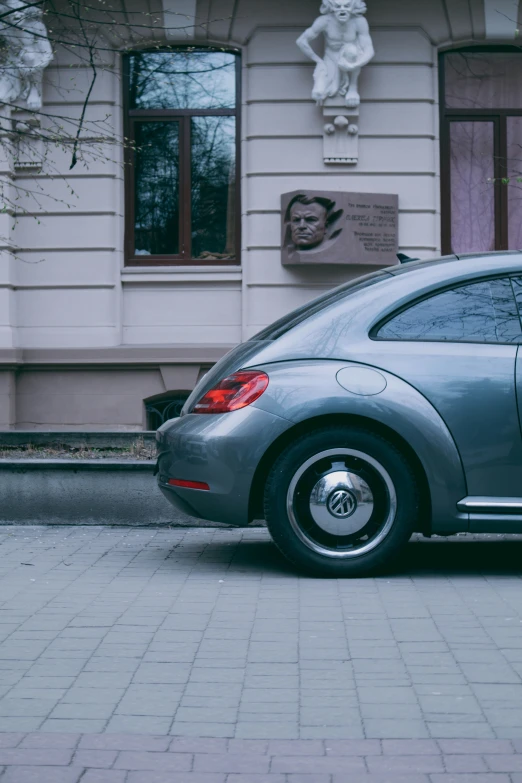 a small car parked on the side of the road