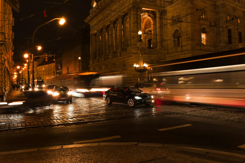 a night time street scene of the busy traffic