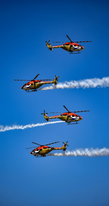 three airplanes flying close to each other in the air